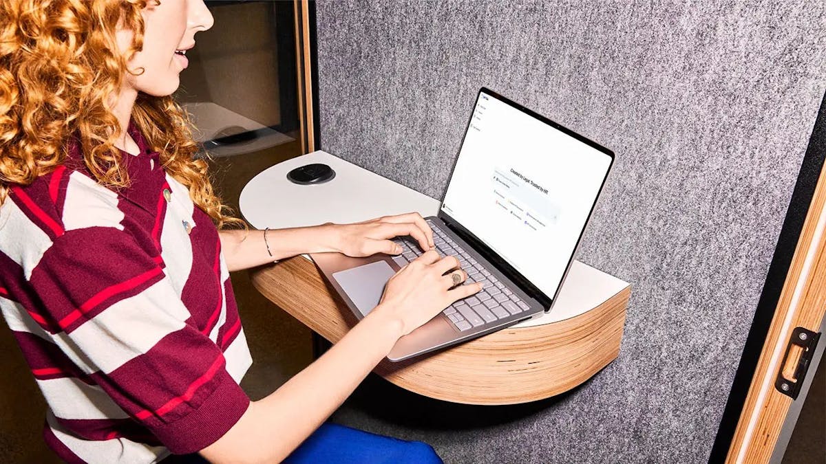 woman typing on computer