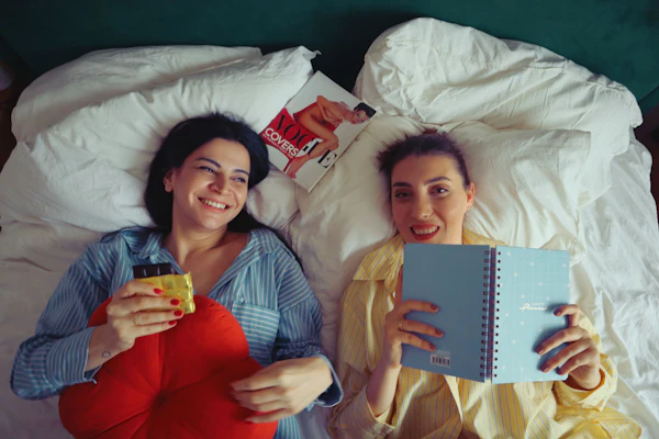 Best friends cozy together with Zayla jewelry