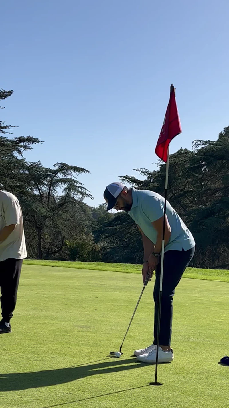 Last putt on the green