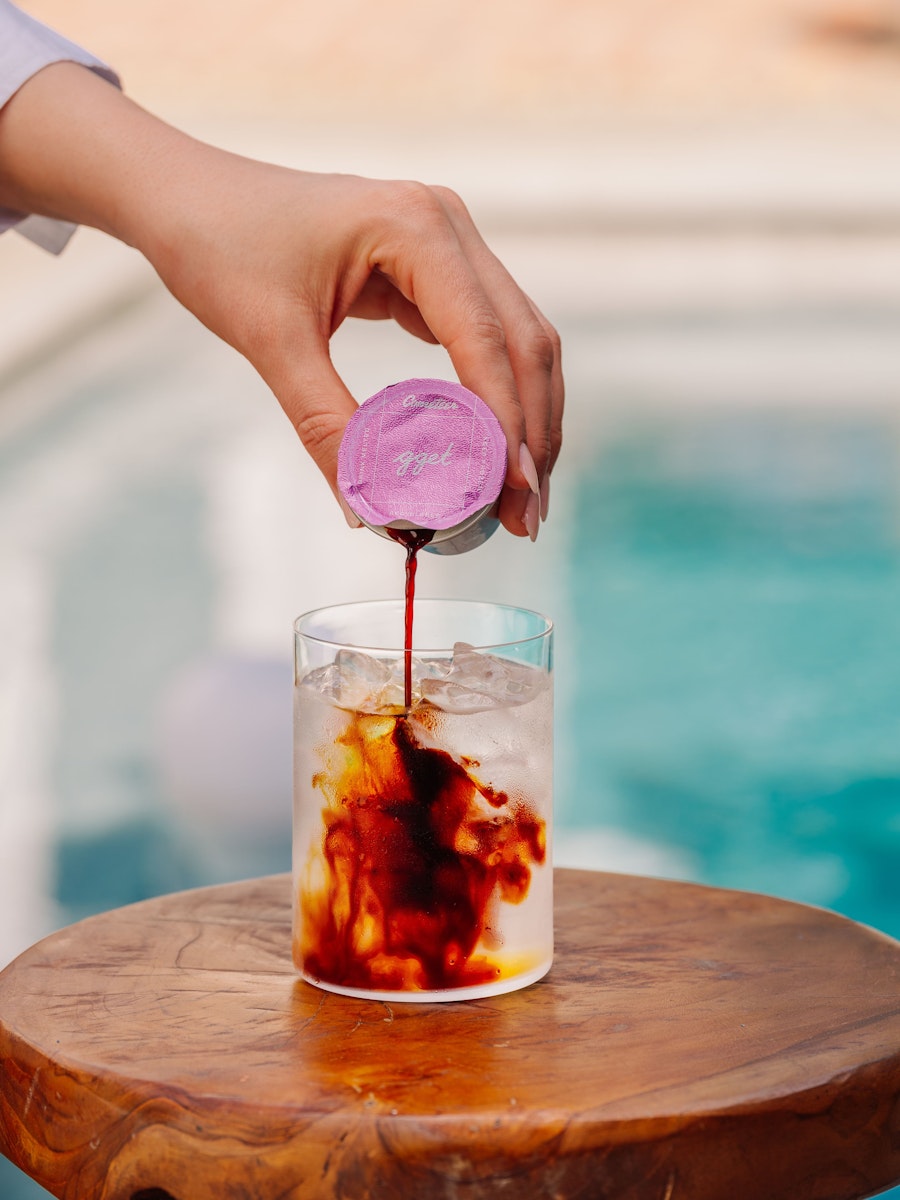 Iced latte being made — cold and ready without planning