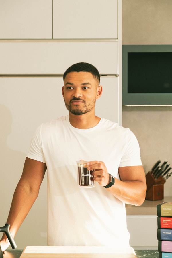 Steven Bartlett holding a finished Cometeer coffee