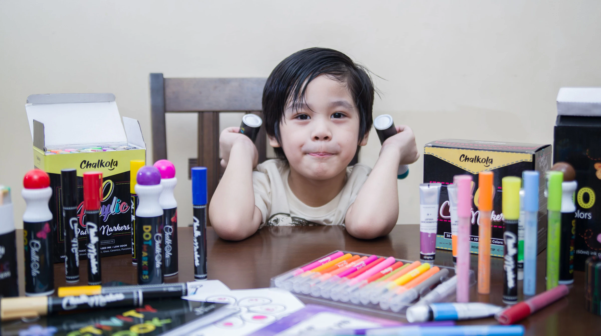 Kids creating art with washable dot markers