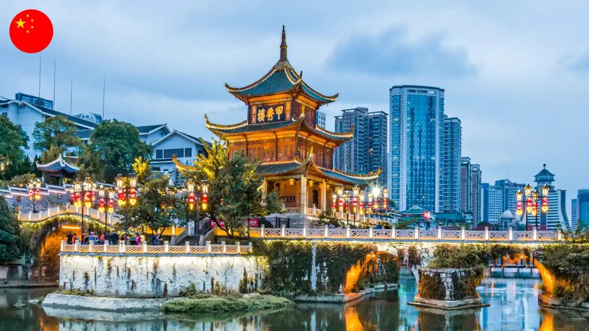 China labor laws blog cityscape with flag