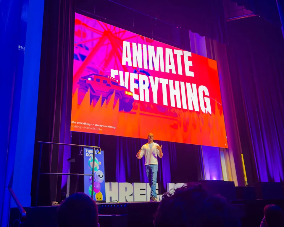 Bruno Simon on stage beside a slide reading "Animate everything" over an illustrated 4x4 climbing a hill