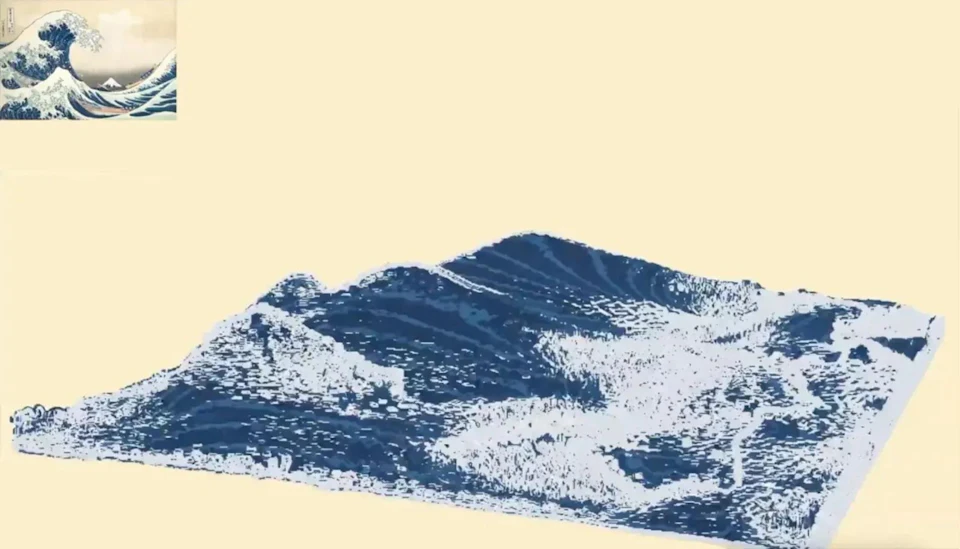 A dense field of blue particles forming Hokusai’s Great Wave as a 3D surface, with the original woodblock print inset in the corner
