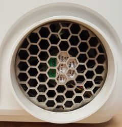 he exhaust fan in the back-left of the Glowforge as viewed from the exterior of the unit