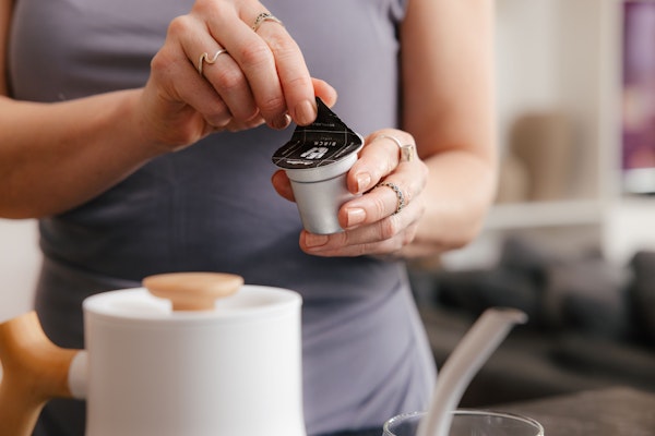 Peeling the lid off a Cometeer capsule