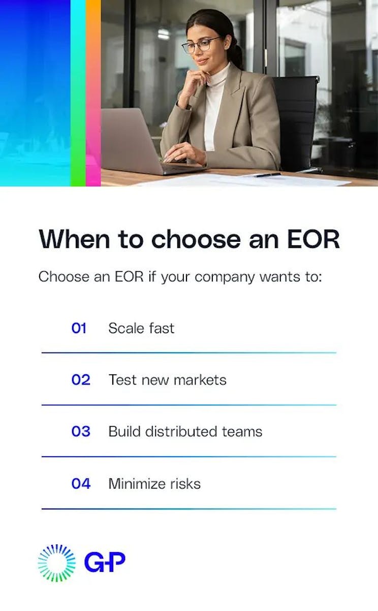 Focused woman working on her laptop from a modern workspace