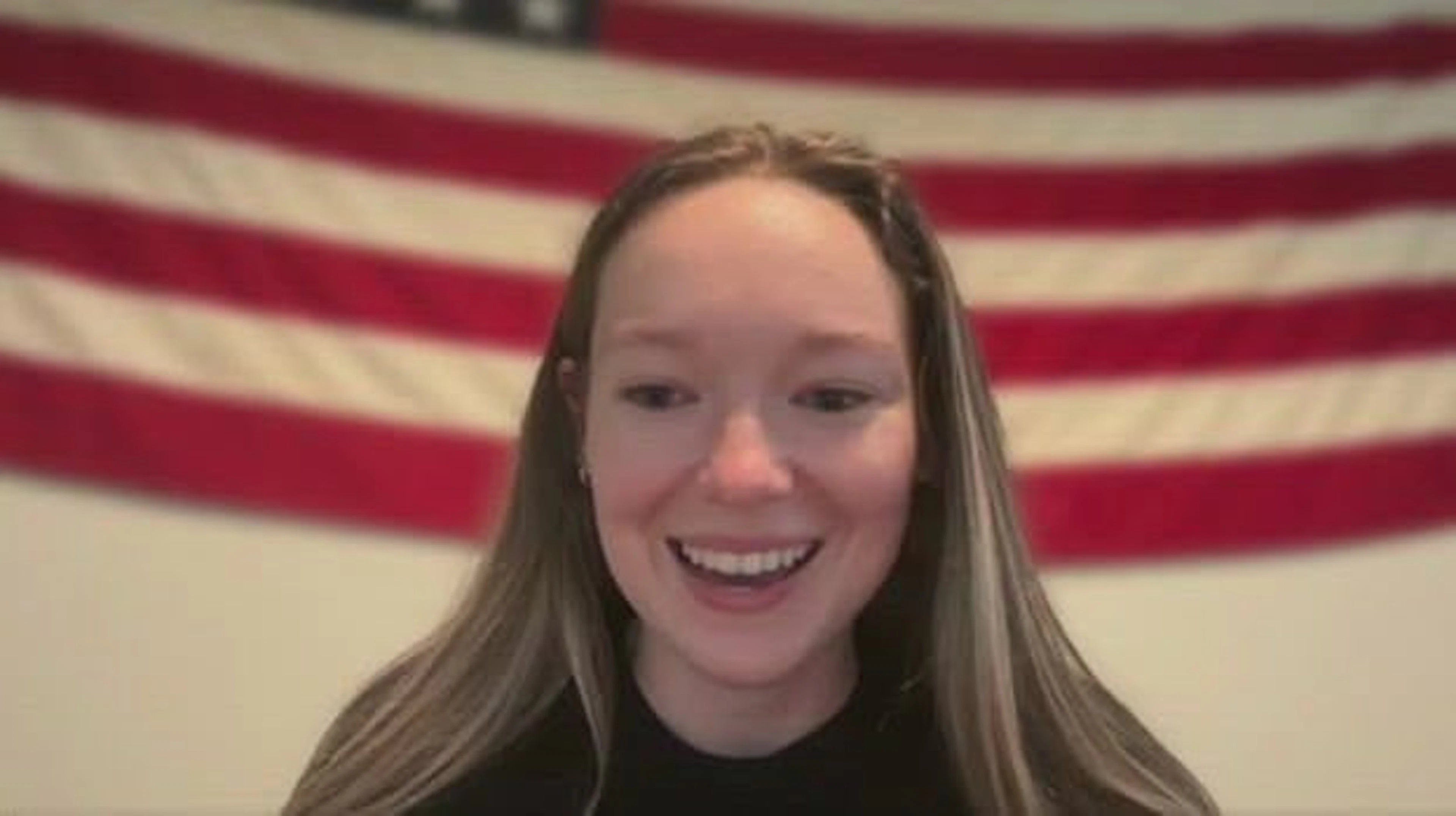 Katie, an Ambrook account manager, smiling on a video call