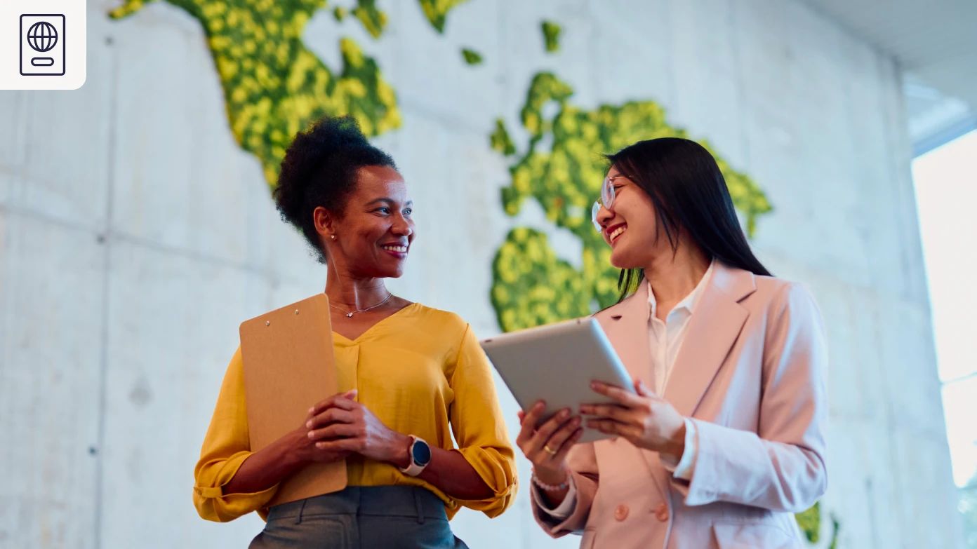 two people walking and talking about global visa sponsorship