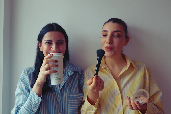 Besties getting ready together with coffee
