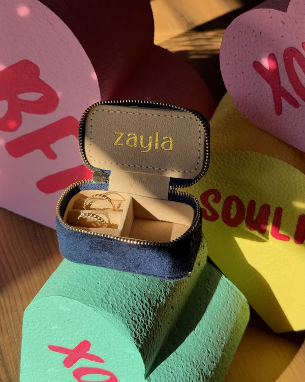 Matching Zayla gold rings on Valentine hearts