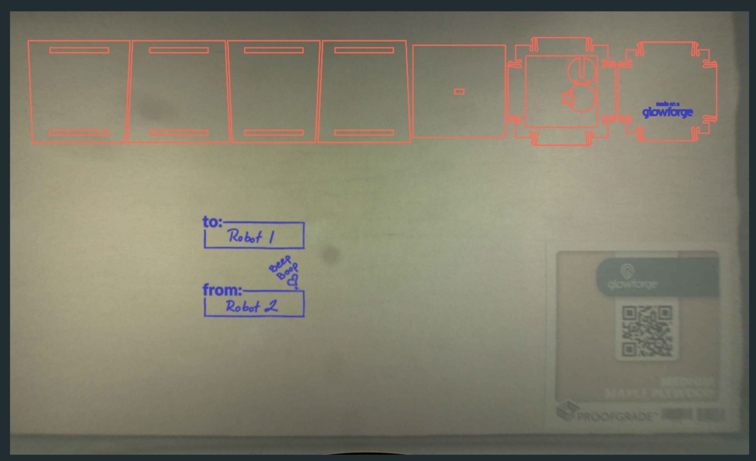 Screenshot showing the print area of the Glowforge, with material loaded and traced artwork in the workspace