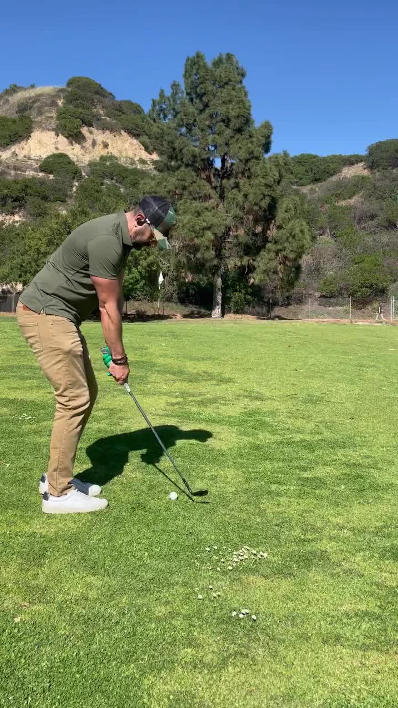 Mid swing on the back nine