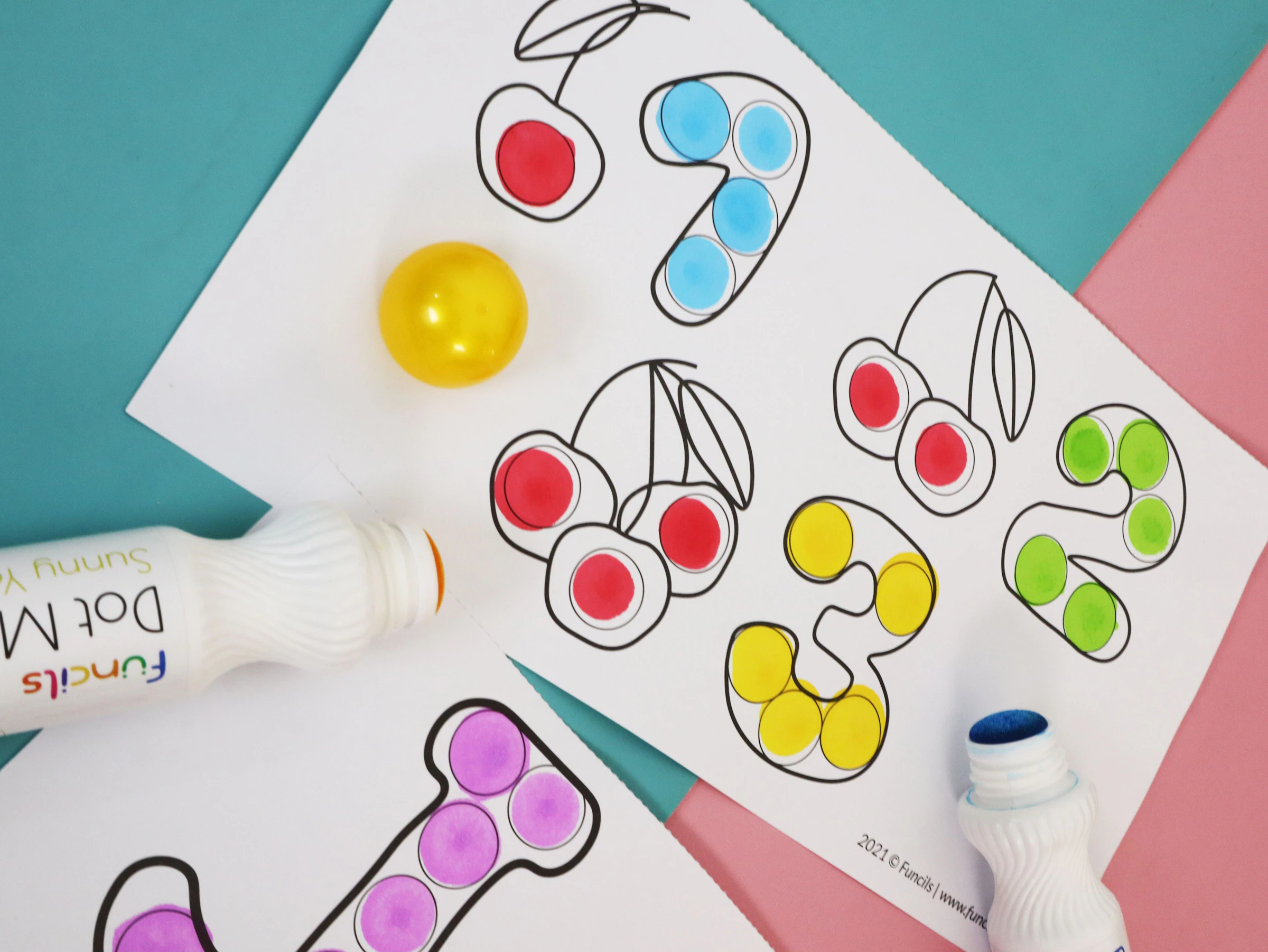 Chalkola dot marker activity books and markers flat-lay