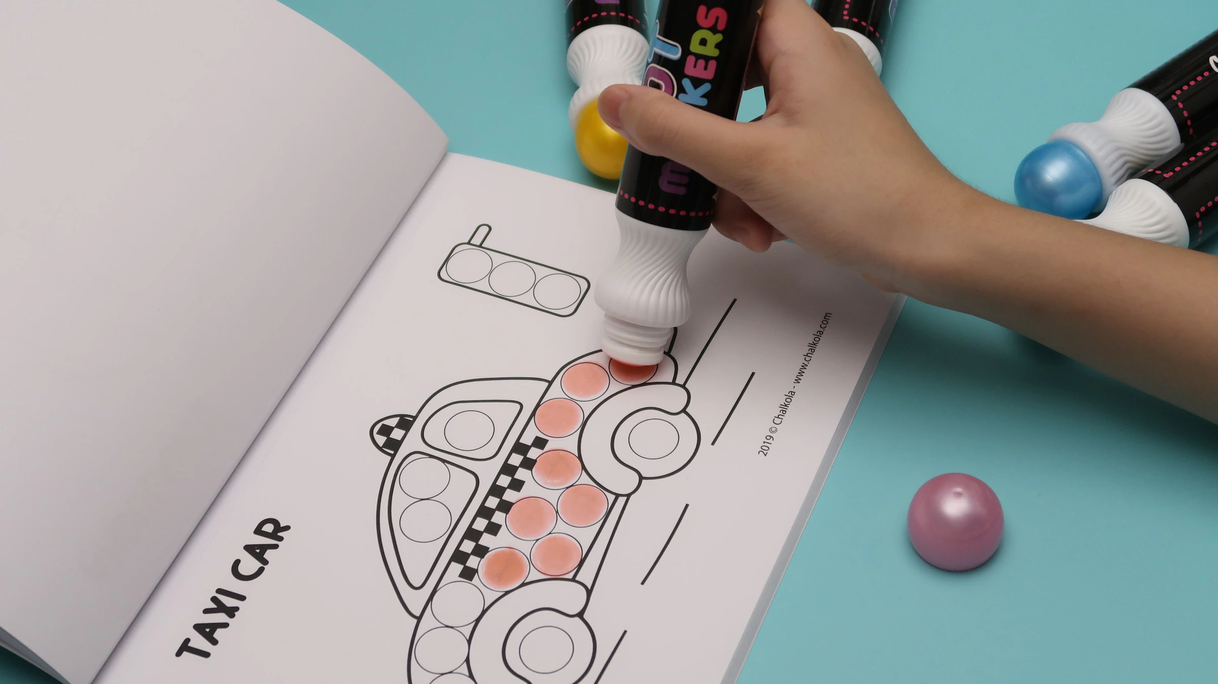 Kids using washable dot markers — lifestyle shot