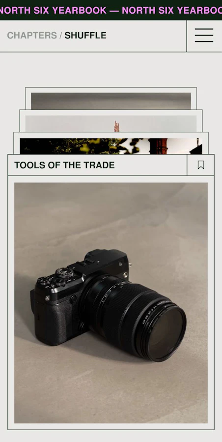 This image shows a webpage with a section titled "TOOLS OF THE TRADE" featuring a photograph of a black camera with a large lens