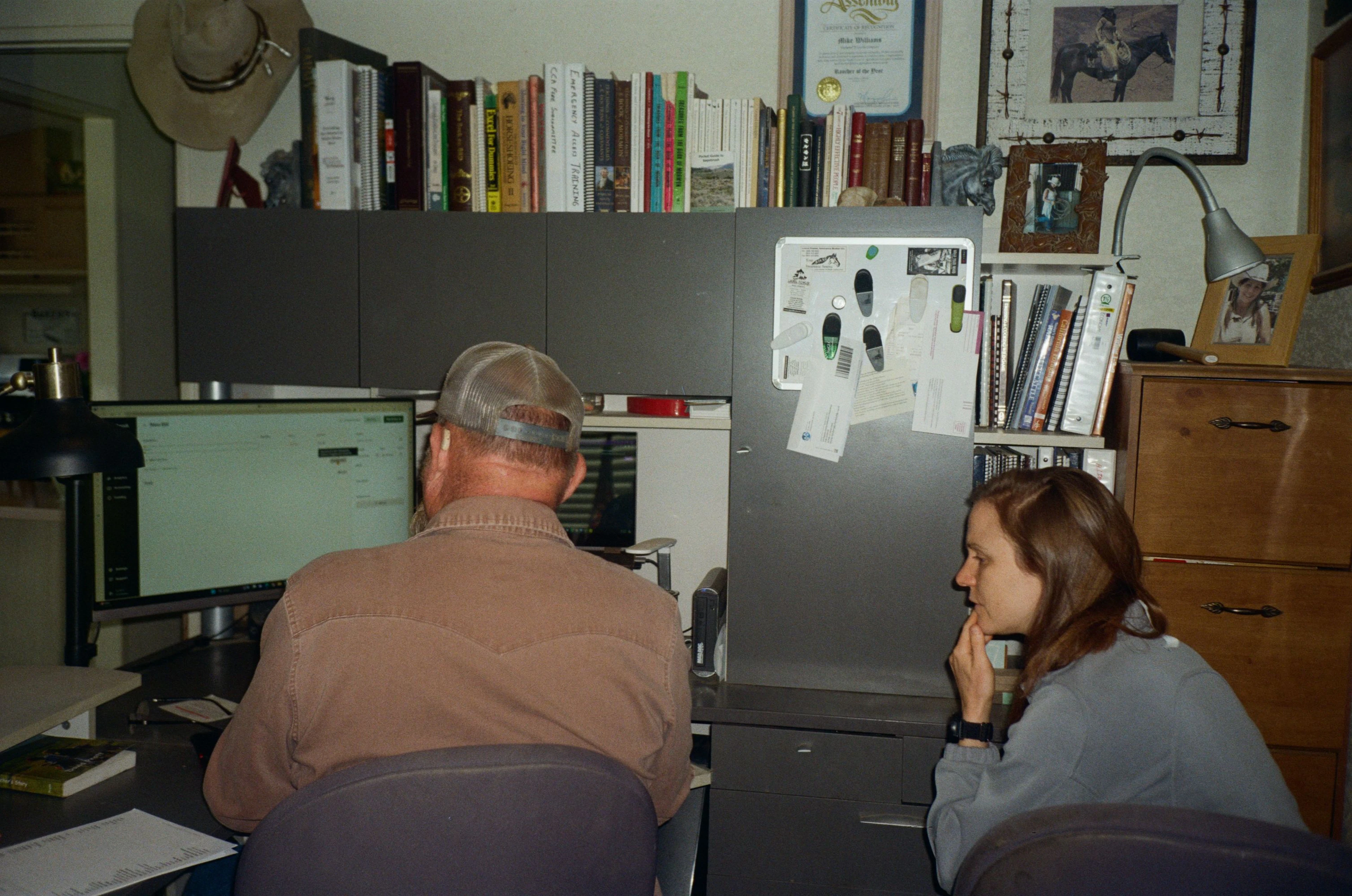 An Ambrook account manager working through the books alongside an operator