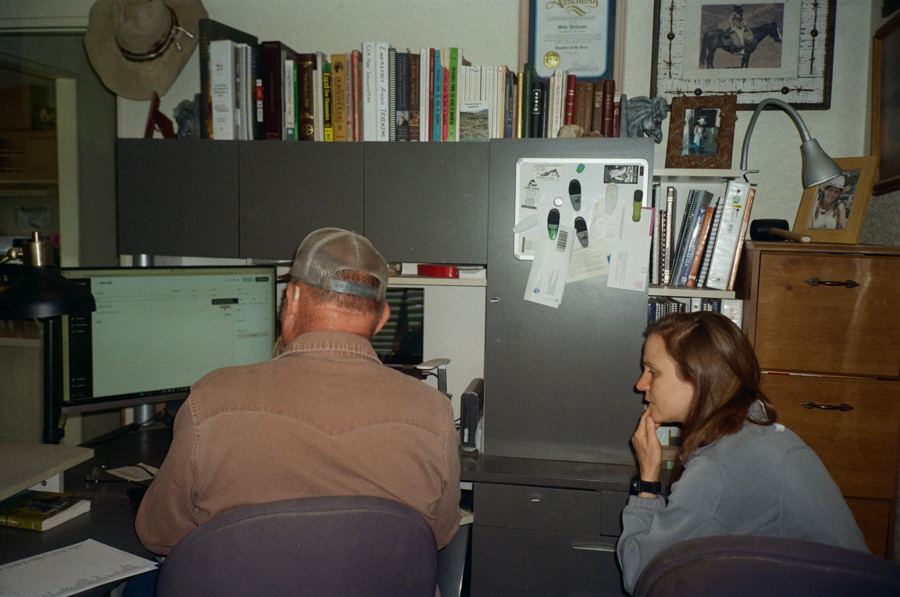 An Ambrook account manager working through the books alongside an operator
